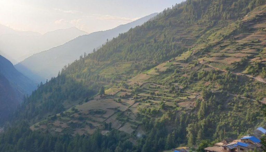 A view of a village in the mountains.